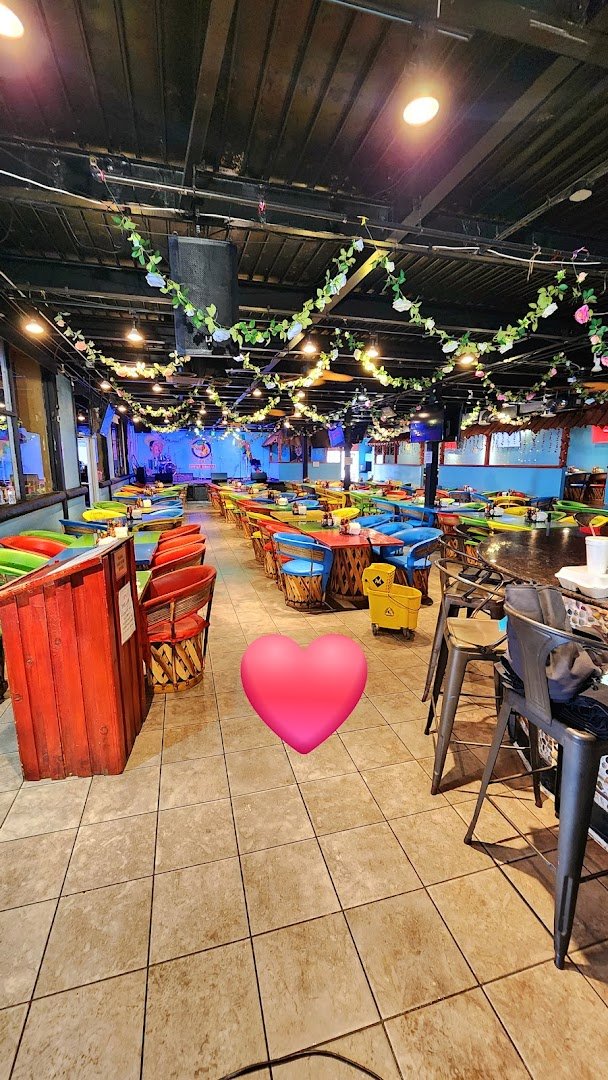 Patio seating outside a Mexican seafood restaurant.